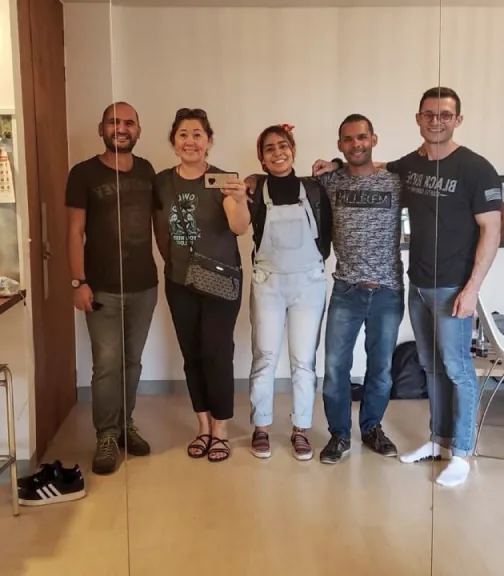 Ana María standing with a group of her Spanish students